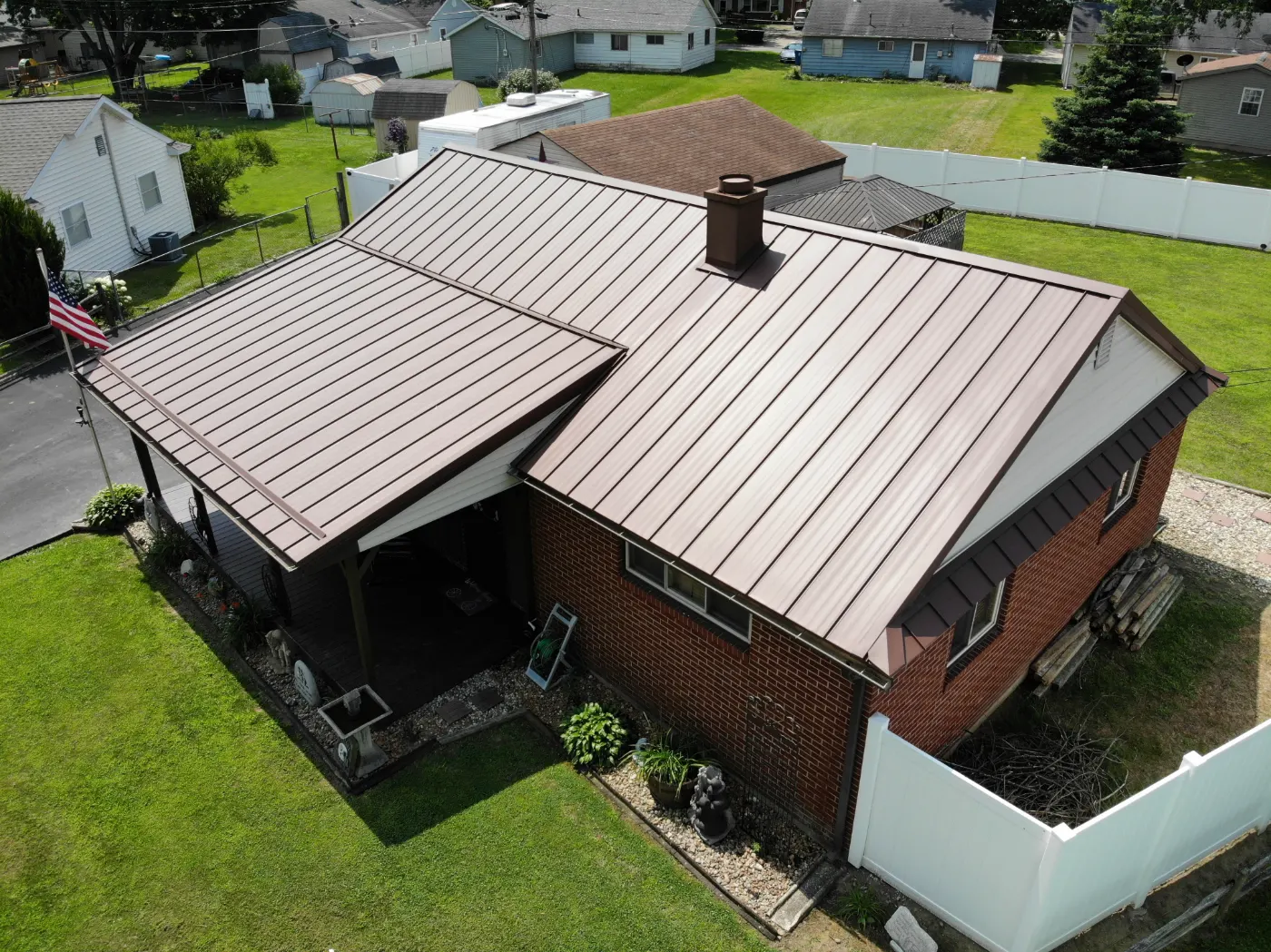 Tarping and dry-in on a Saddle Creek commercial roof